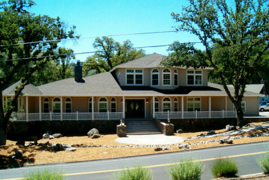 This custom home was designed for a couple on a golf course at the north end of Yosemite.  The two story project took advantage of the views while hugging two holes of the golf course.